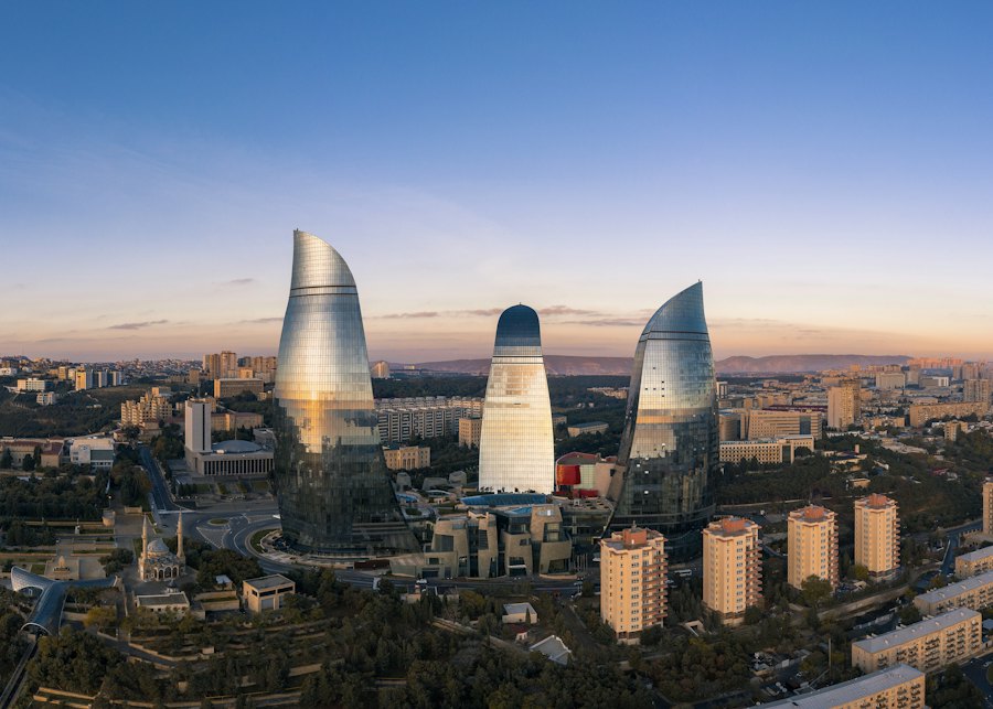 The Flame Towers rising over Baku at dusk