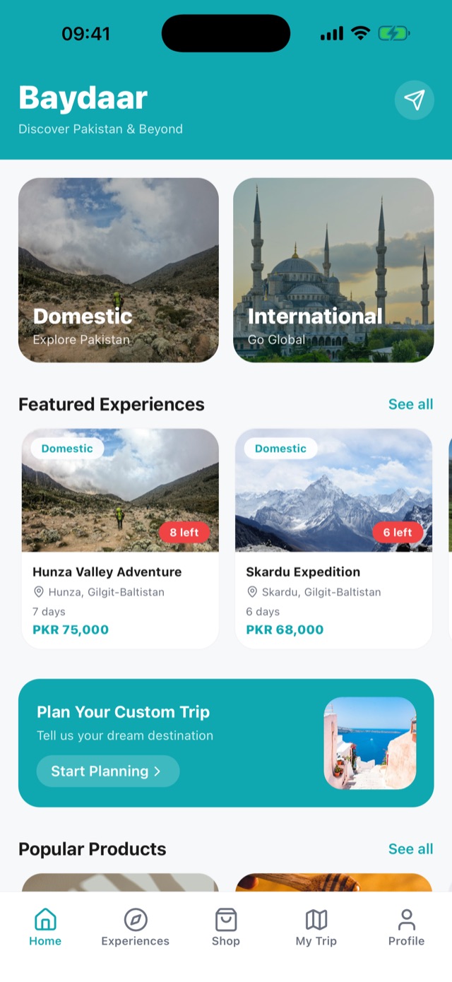 Baydaar home screen showing Domestic and International trips and featured experiences